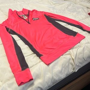 Pink athletic pull over